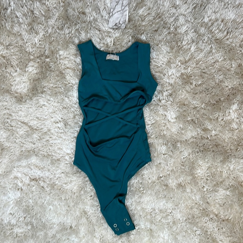 Oh Polly body suit. New with tags. Never worn.